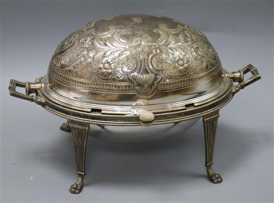 An Edwardian plated engraved breakfast tureen with swivel dome cover and a Victorian plated mounted claret jug